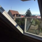 Installation d’un balcon sur le toit avec la pose d’une fenêtre de toit verrière Velux à Sausheim, près de Kingersheim dans le Haut-Rhin